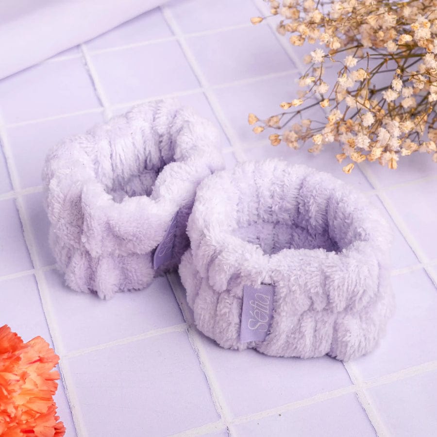 Paire de bandeaux de poignets Sefia en éponge lilas